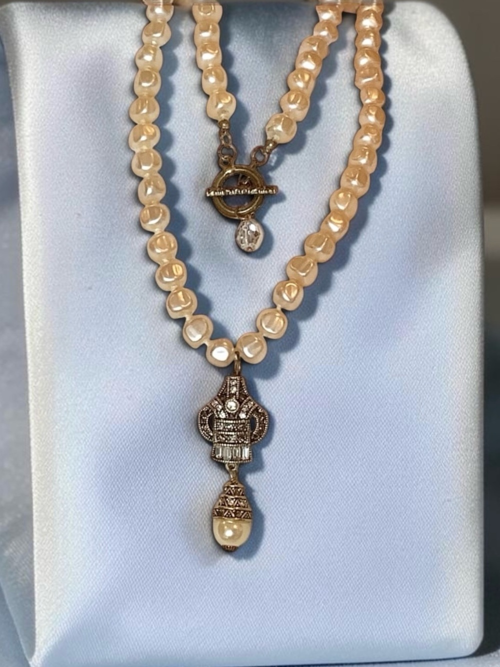 Heidi Daus  Antique Gold Pendant With Swarovski Crystals And A Pearl Drop.